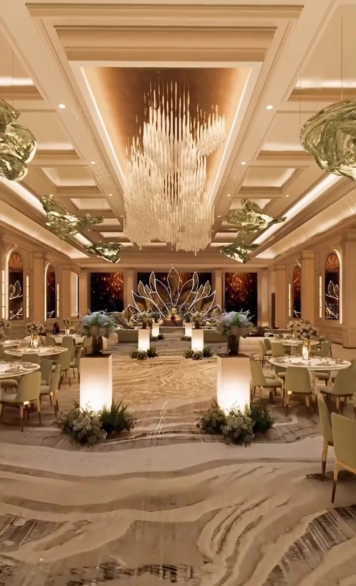 Visualisation: Ceremonial aisle beneath a crystal chandelier, framed by glowing plinths and white florals