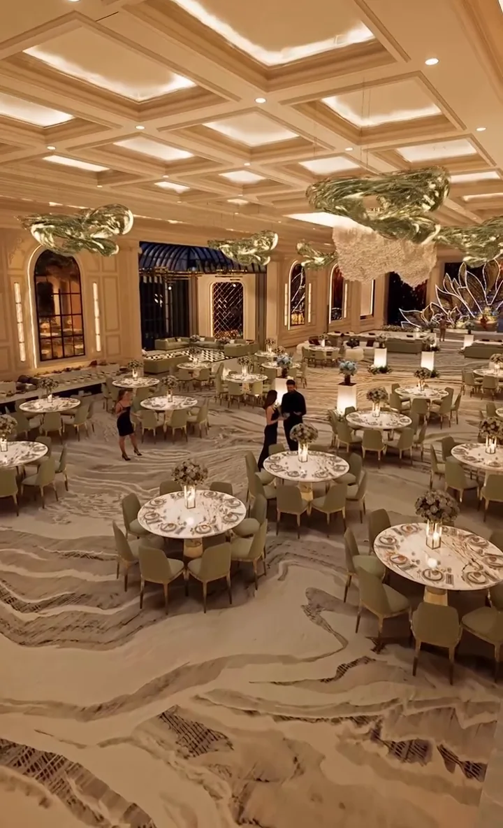 Visualisation: Celebration hall set with tables and lounge clusters under a coffered ceiling