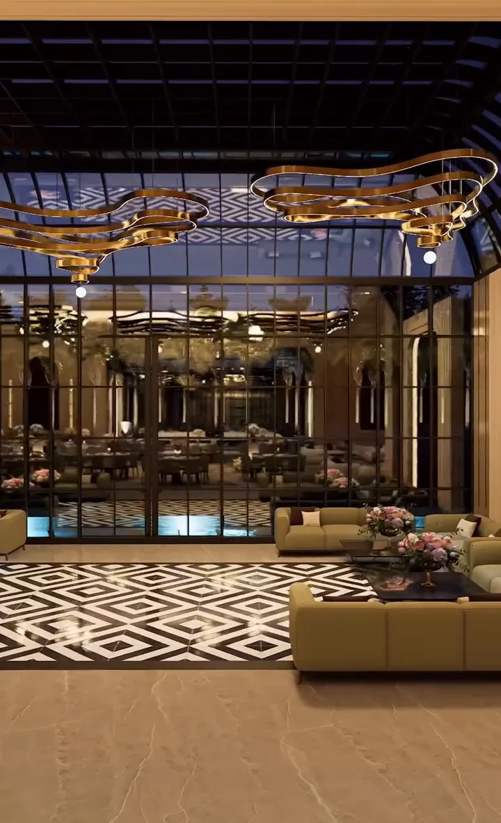 Visualisation: Glass-roofed pavilion at dusk with sculptural gold chandeliers and geometric marble floor