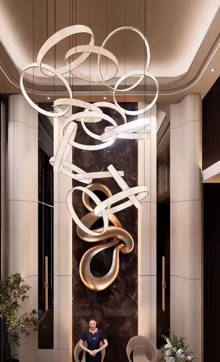 Visualisation: the lobby of The Ellysiaa with its sculptural ring chandelier