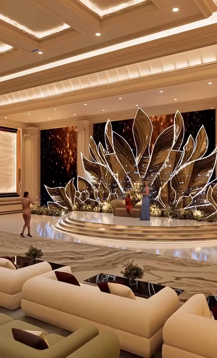Visualisation: A sculptural lotus stage installation glowing at the head of the celebration hall