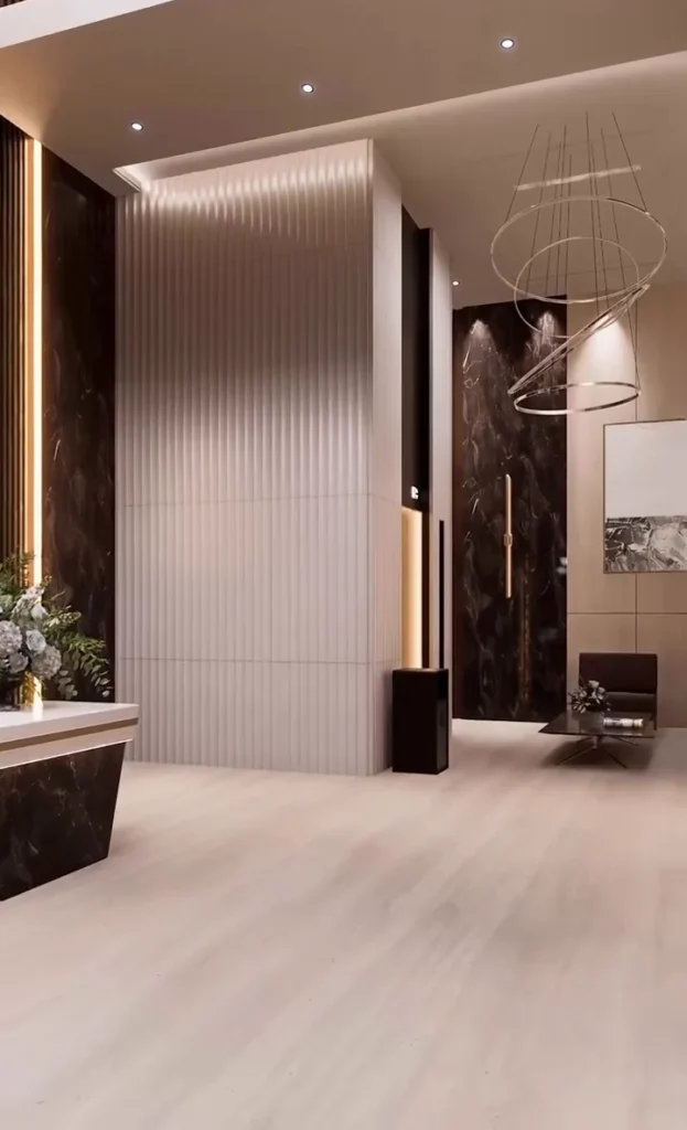 Light-filled gallery corridor with fluted panelling and pendant rings